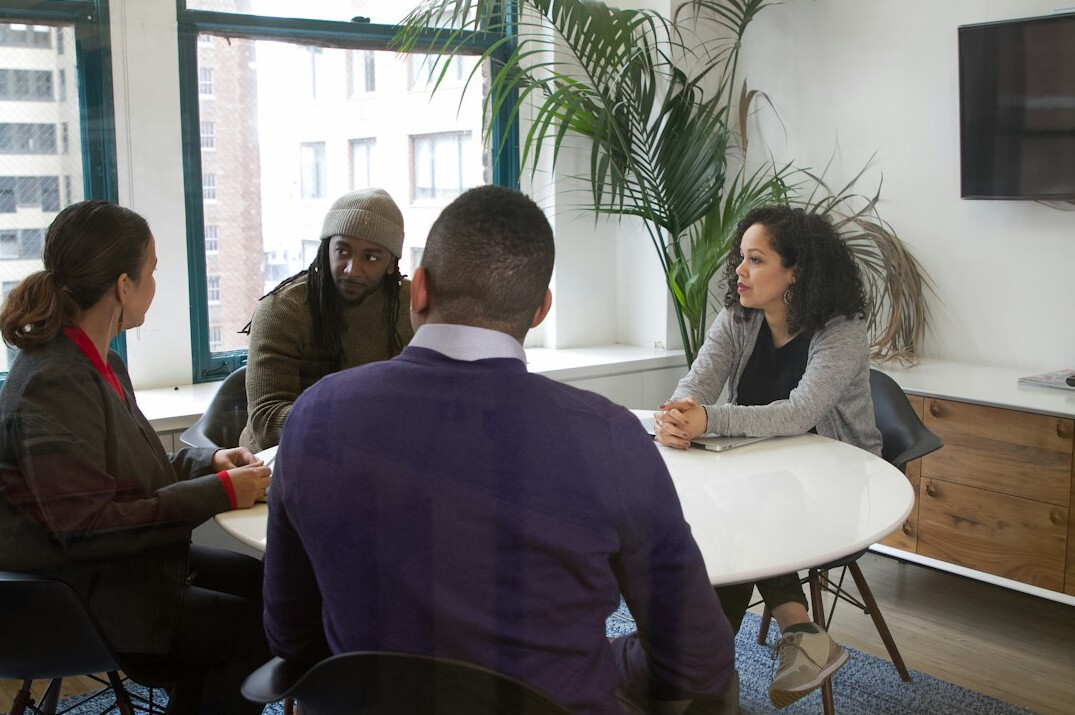 confident person speaking in meeting