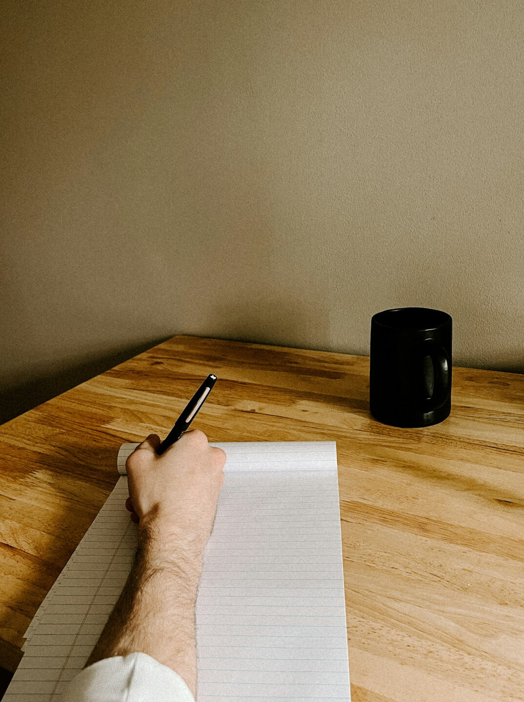 journal writing at desk