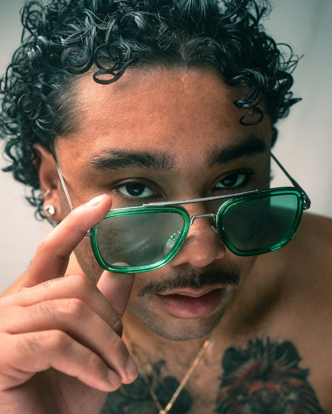 Portrait of a Brazilian man with glasses smiling